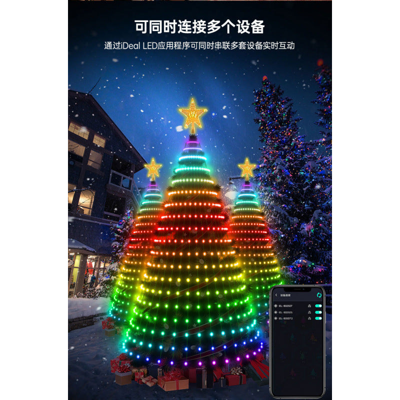 Three Christmas trees linked together with smart LED lights