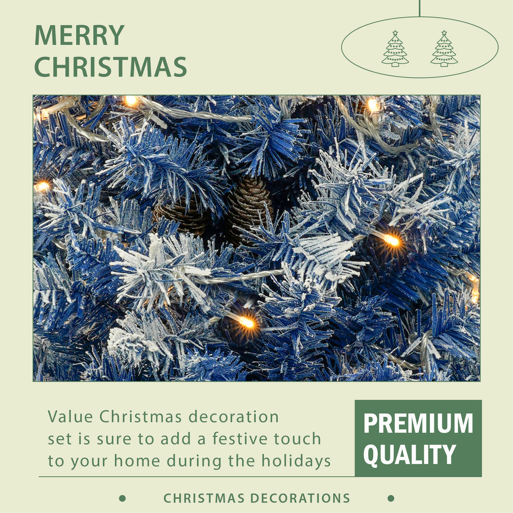 Blue flocked branches with warm lights — premium Christmas decor