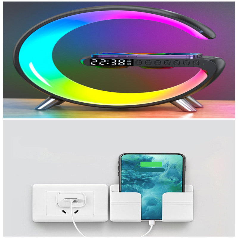 G lamp glowing rainbow colours, with a phone charging station view