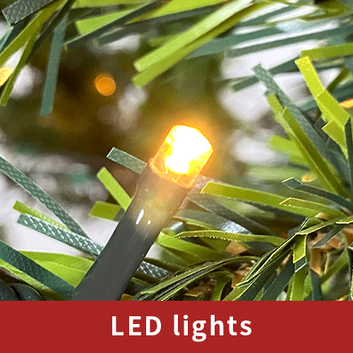 Warm white LED light close-up on a branch