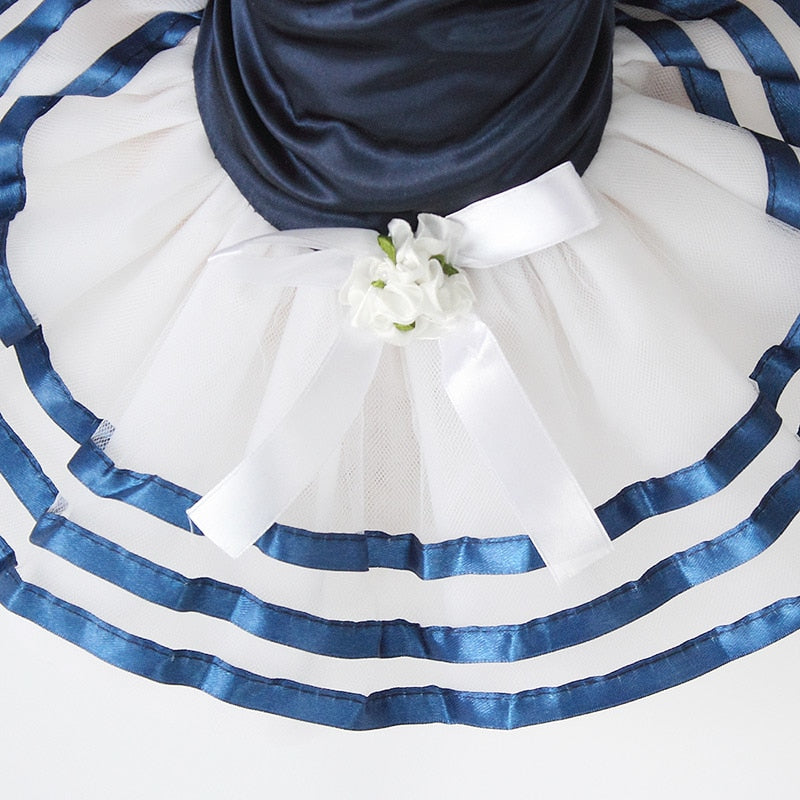 Close-up of the tutu skirt with blue stripes and bow detail
