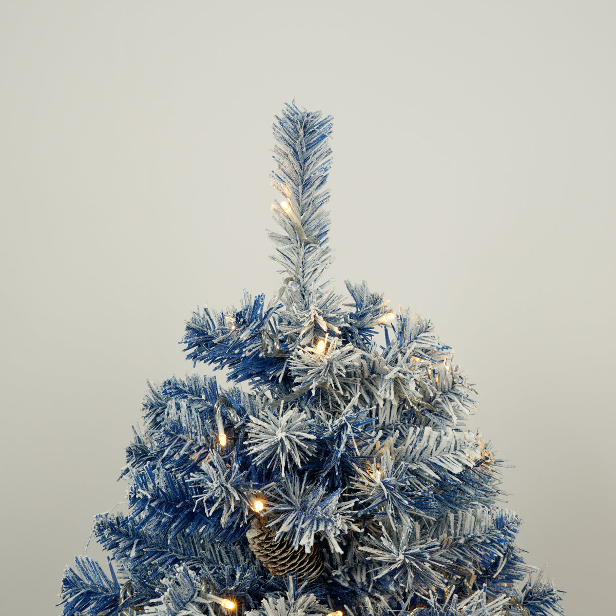 Top of the blue flocked entrance tree