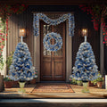 Blue flocked entrance trees and wreath on a porch at dusk