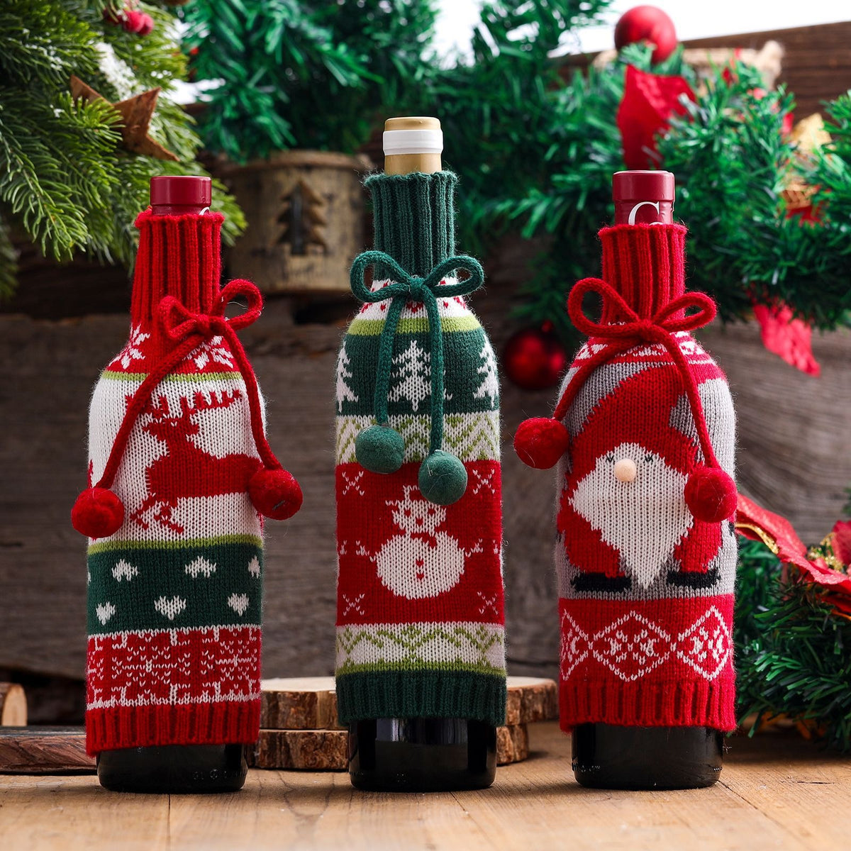 Christmas wine bottle covers on bottles by a decorated tree