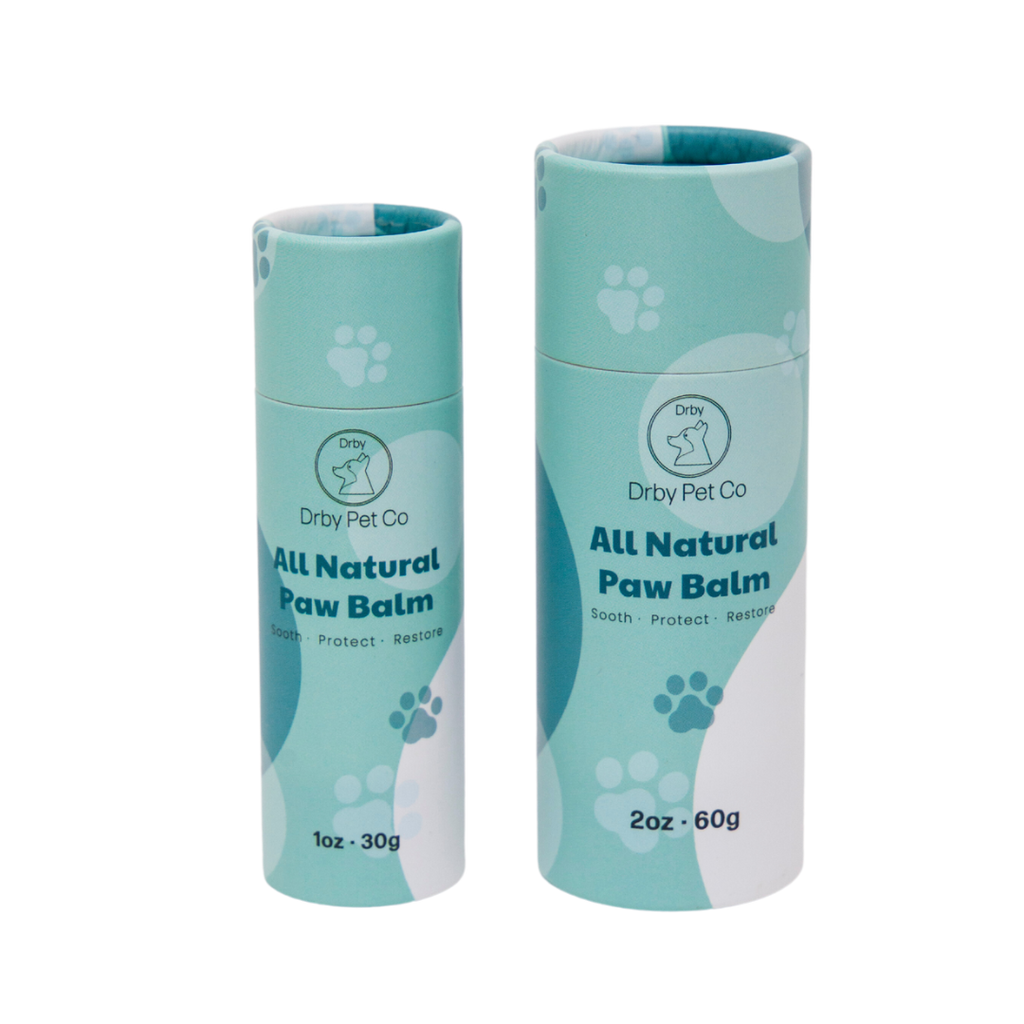Drby paw balm in 1 oz and 2 oz push-up tubes side by side