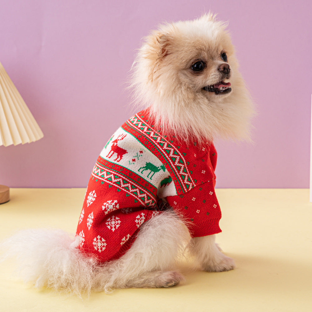 Pomeranian wearing a red Christmas tree and elk dog sweater by DealSpark