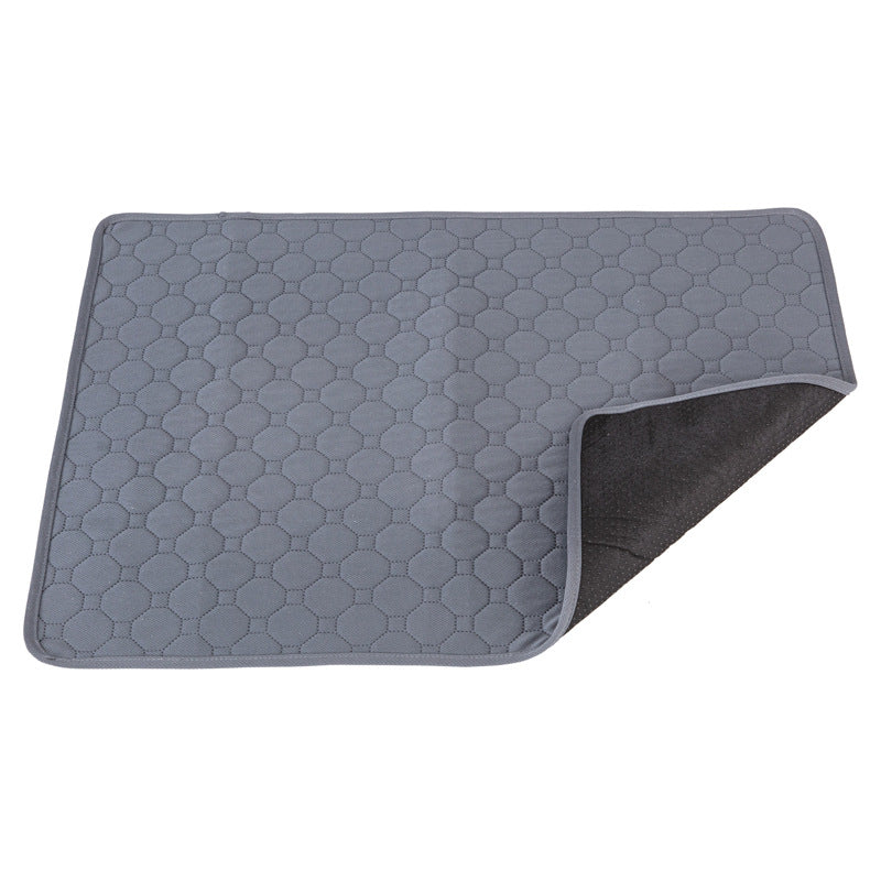 Grey washable training pad for dogs, corner folded