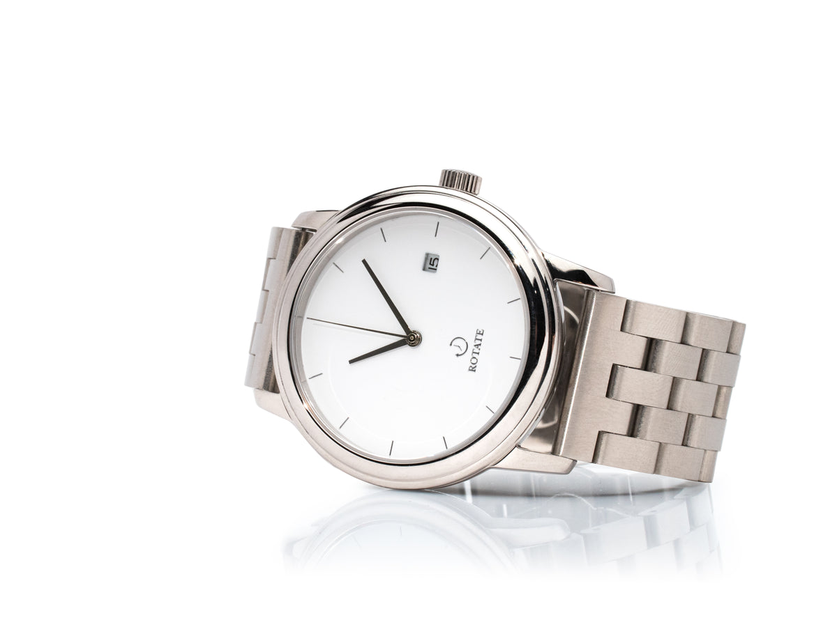 Newton mechanical watch with stainless steel strap, side view