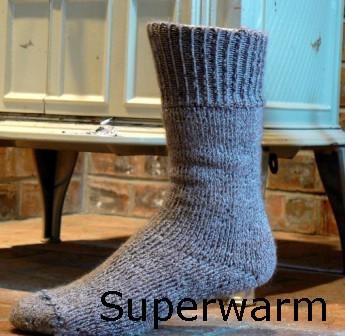 Grey Superwarm alpaca sock worn on a foot — thick thermal knit